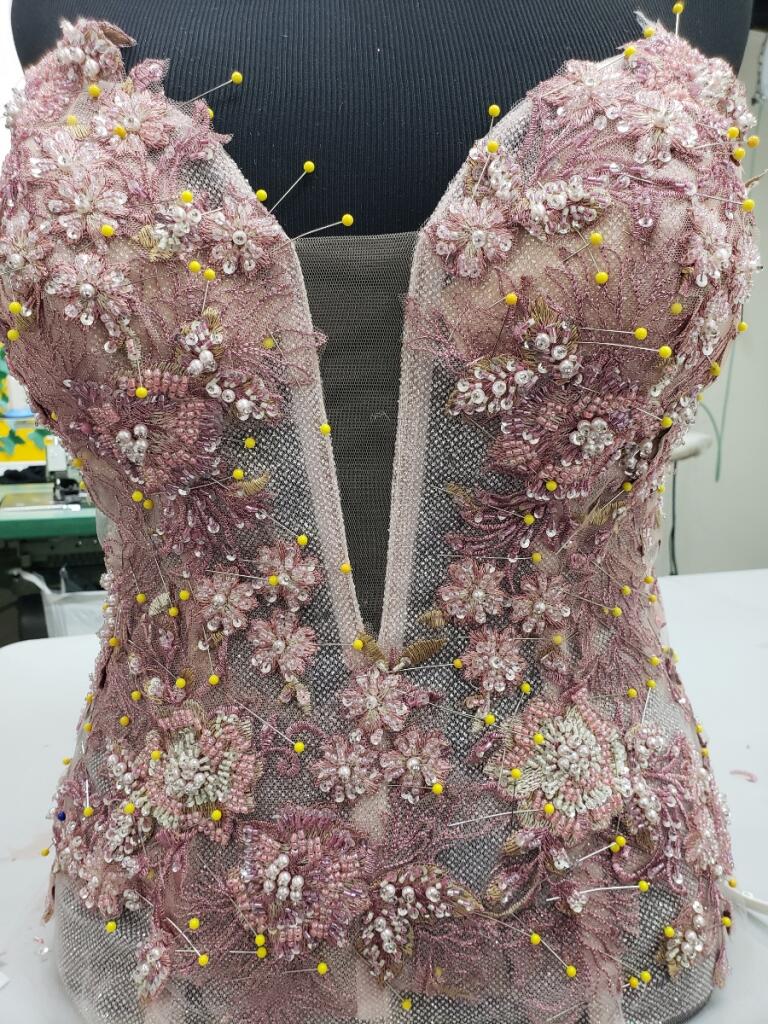 Hand-pinned floral bodice in progress at Margo West Bridal Couture Dallas TX