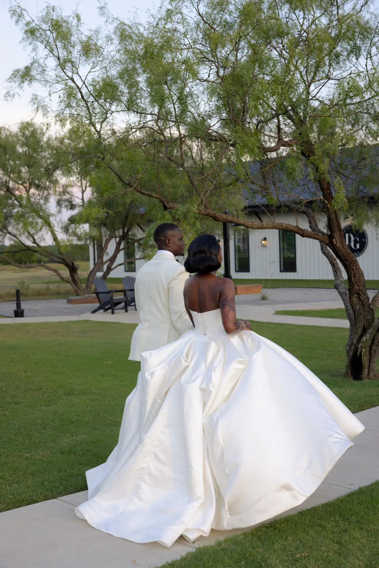 Custom bridal gown with a full train constructed at Margo West Bridal Couture, Dallas TX