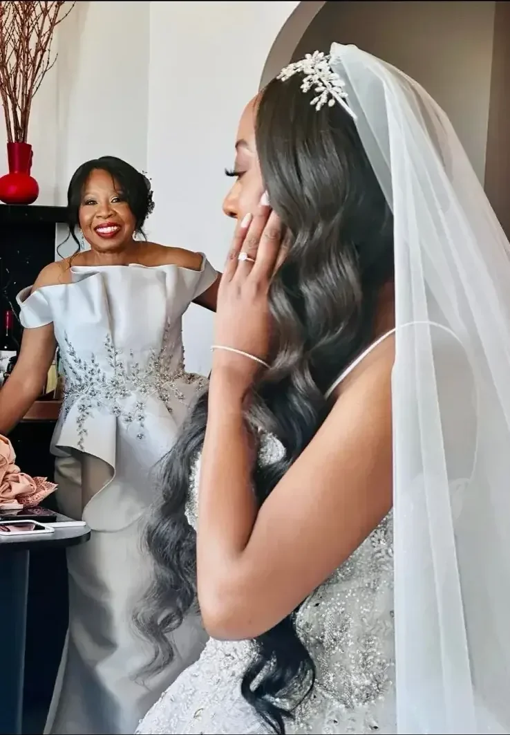 Tiffany Fowler bespoke wedding dress with veil Margo West Dallas TX