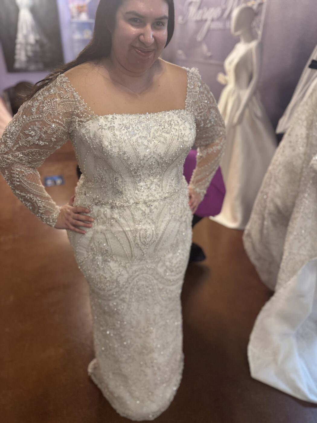 Beaded long sleeve sheath gown after alterations at Margo West Bridal Couture, Dallas TX