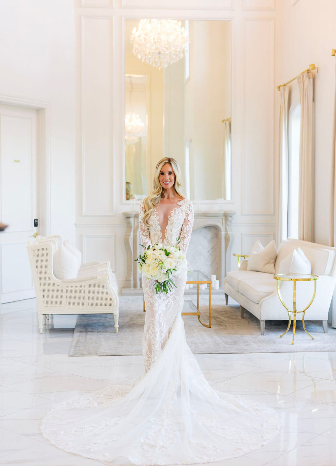 Bride in a full length lace wedding gown after alterations at Margo West Bridal Couture, Dallas TX