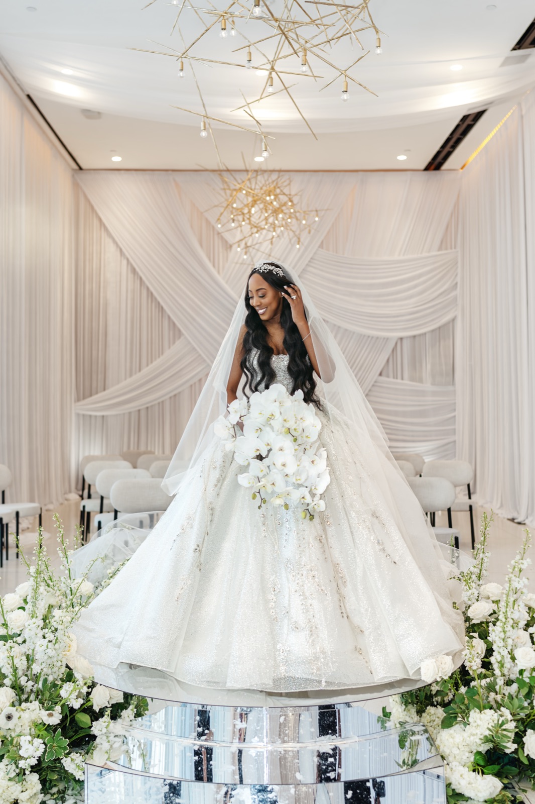 Bride in a princess ballgown and cathedral veil by Margo West Bridal Couture, Dallas TX