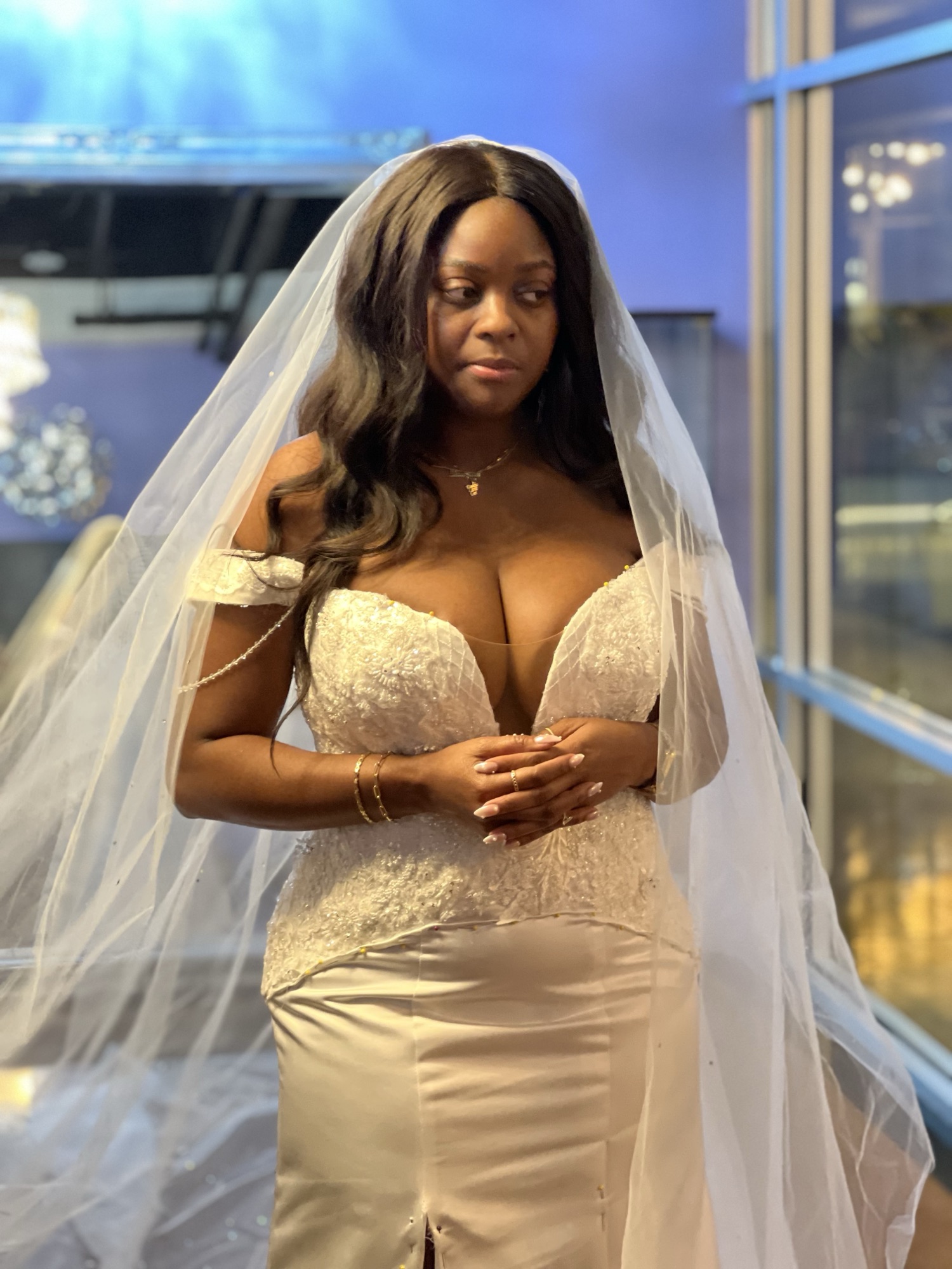 Custom illusion lace sleeves added to a wedding gown by Margo West Bridal Couture, Dallas TX