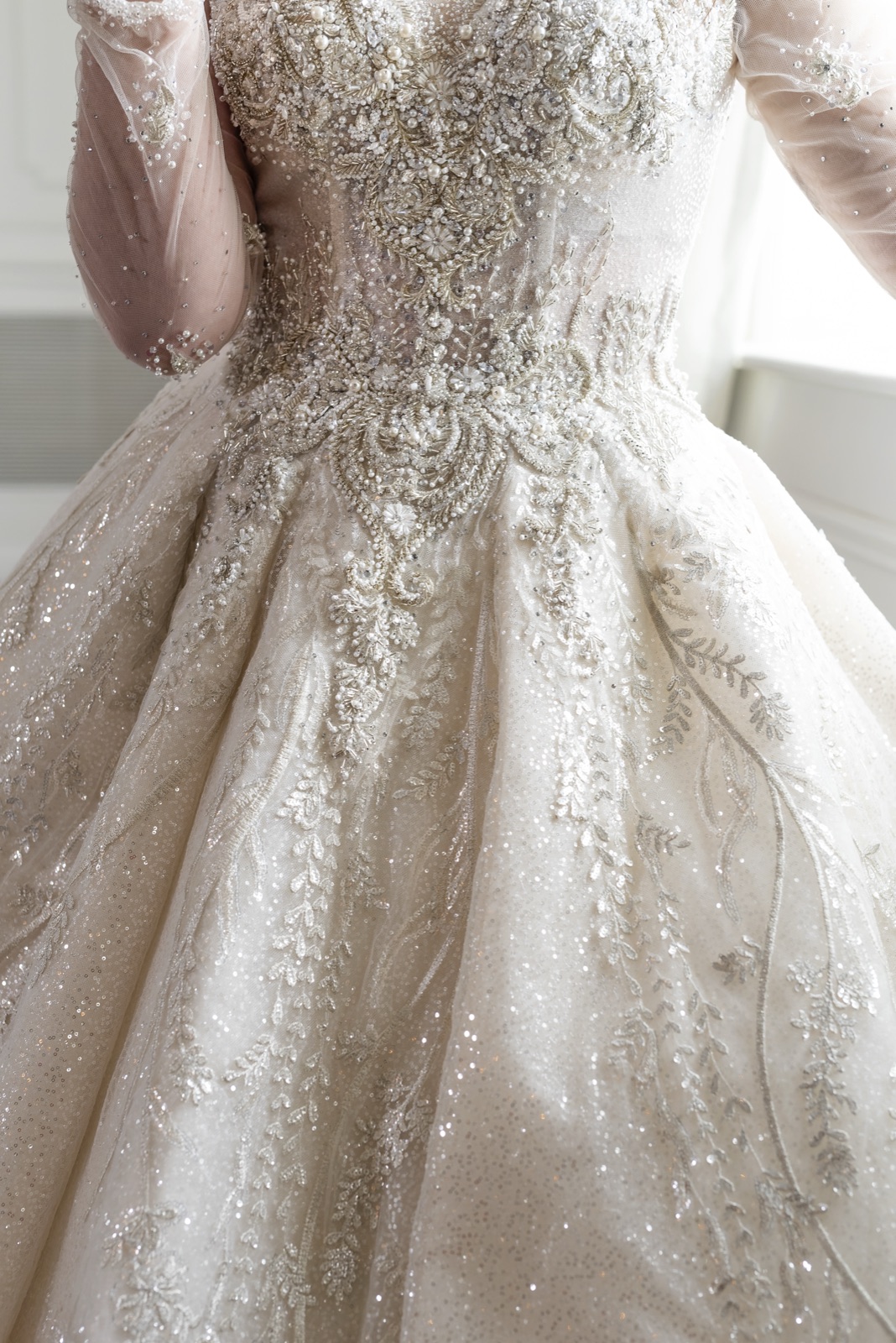 Custom illusion lace sleeves on a bespoke gown by Margo West Dallas TX
